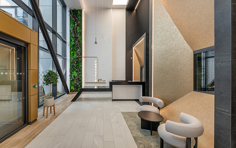Receprion area in a commercial office building with seating and large glazed window