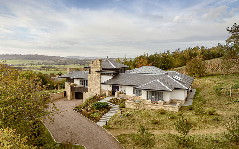 Architectural exterior of a residential property at dusk