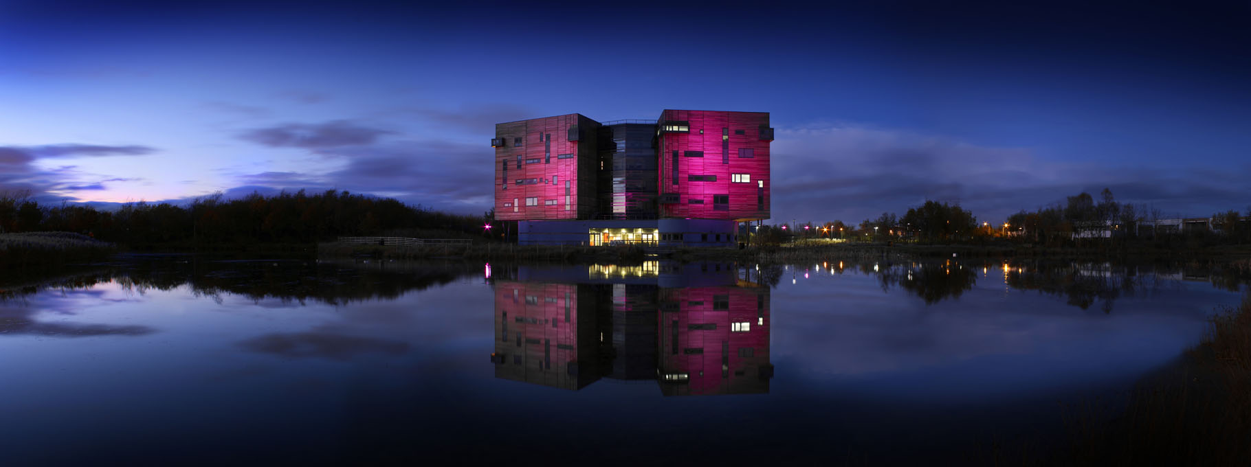Architectural exterior of a commercial office at dusk