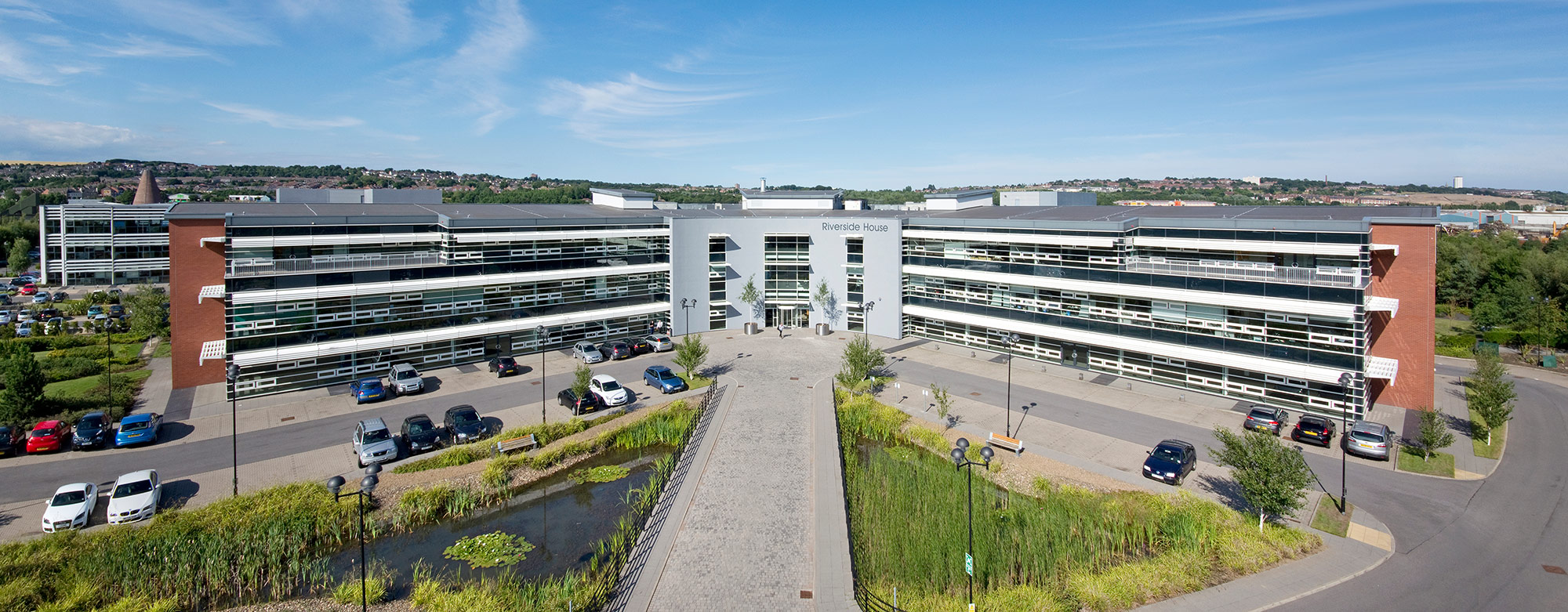 Modern office building exterior taken from a mast at elevated height architectural photography