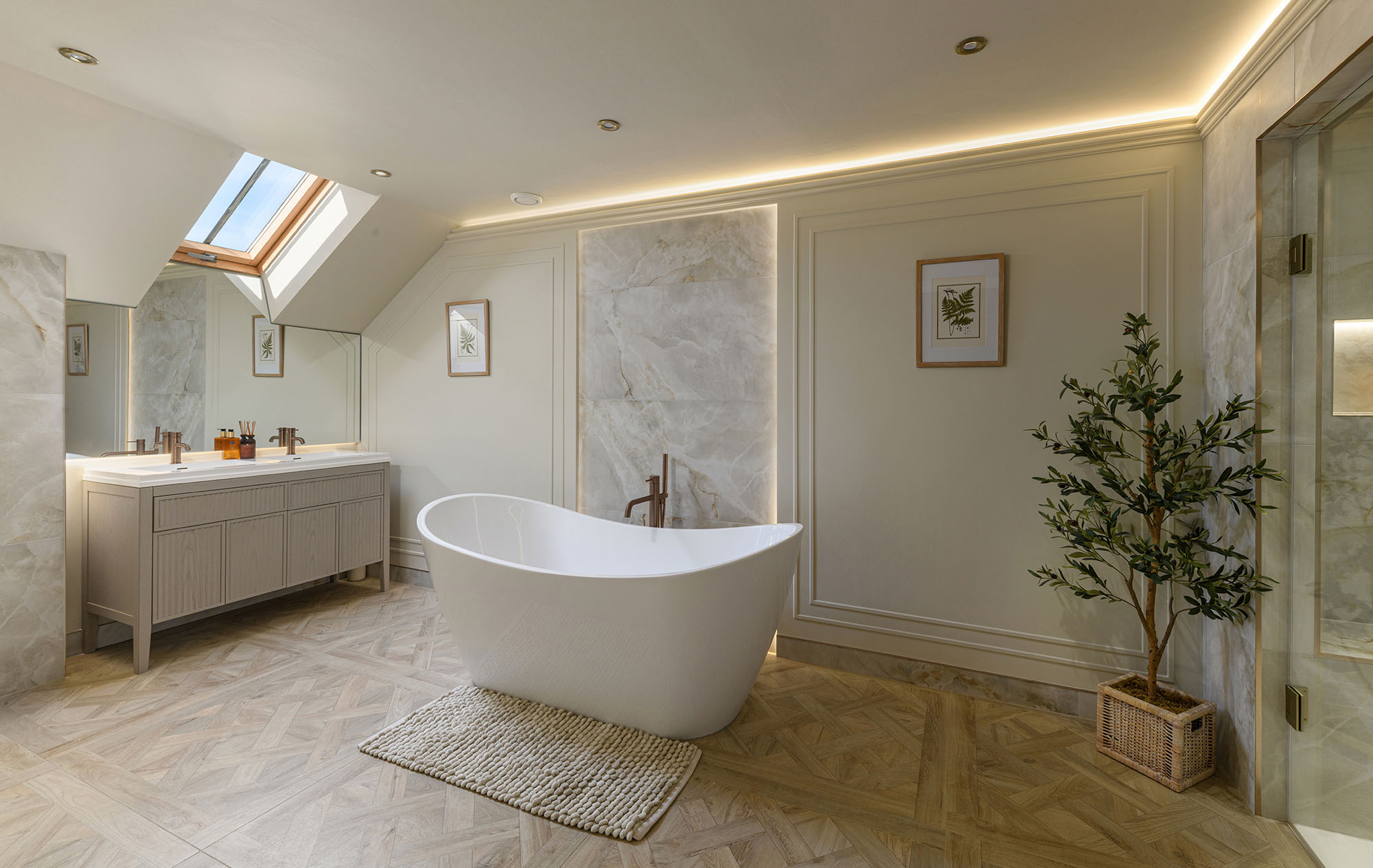 bathroom interior with roll top bath, shower area and lighting details