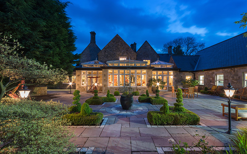 Exteriors of a residential property at dusk