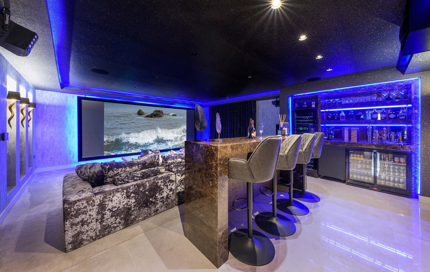 Residential cinema room with feature lighting