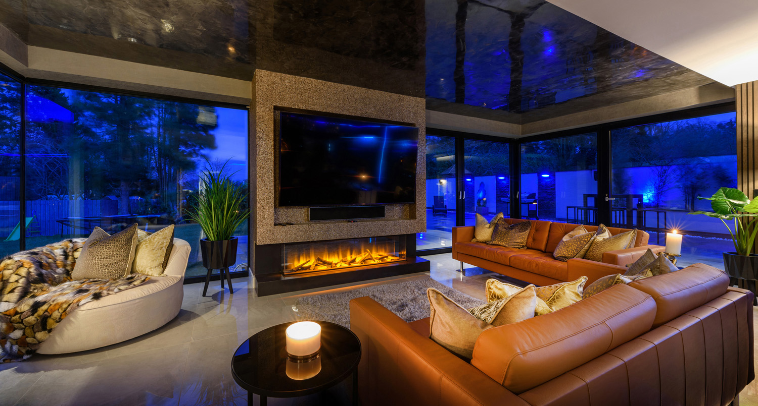 Interior detail of residential living area at dusk with feature lighting